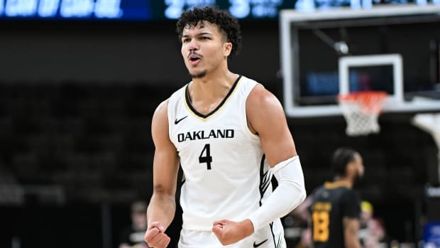 Mar 12, 2024; Indianapolis, IN, USA; Oakland Golden Grizzlies forward Trey Townsend (4) celebrates after a play against the Milwaukee Panthers during the second half at Indiana Farmers Coliseum. Mandatory Credit: Robert Goddin-USA TODAY Sports